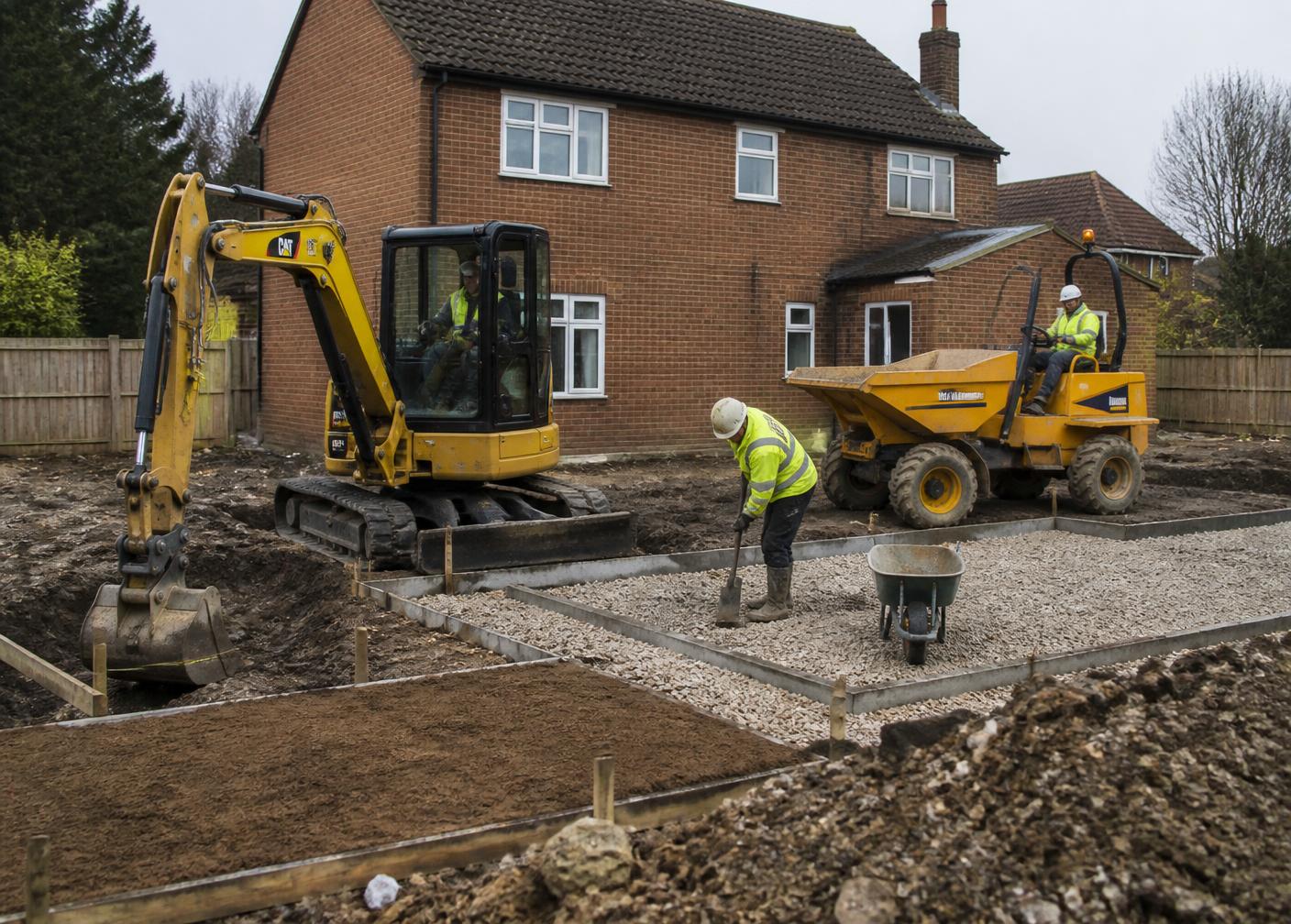 Excavator carrying out groundworks on a UK site